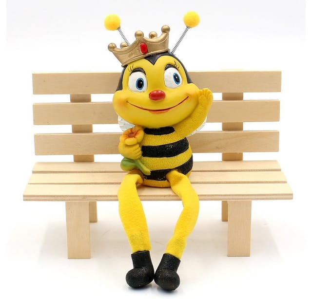 Dekohelden24 Gartenfigur Dekofigur Kantenhocker Bienen-Bienenpaar mit Blume, 2er Set, Polyresin