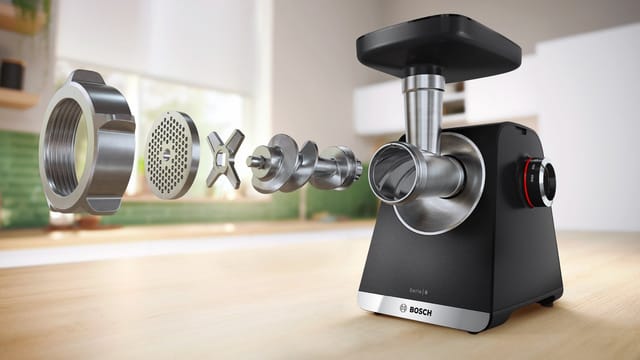 BOSCH Fleischwolf Serie 6 MFWS682B, 3,5kg/Min., Zitruspresse, Raspel, Wurststopfer, 500 W, 2 Lochscheiben (3&8mm), 10 J Motorgarantie, Planetengetriebe, schwarz